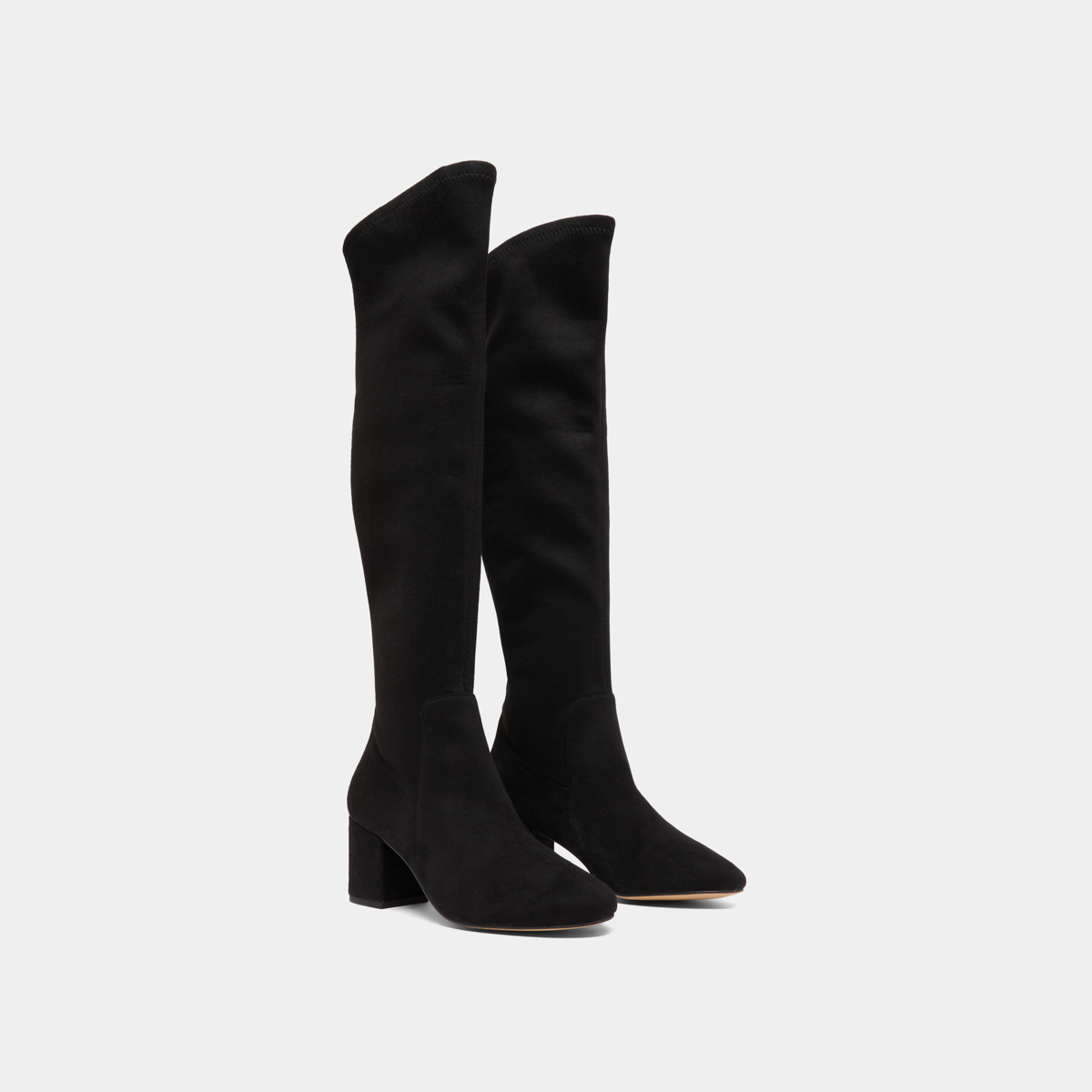 Thigh-high boots with low heels in black stretch and velvet | MIA