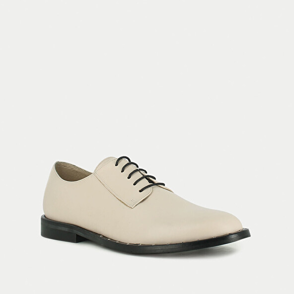Beige leather derbies with studded sole | DIANTHO