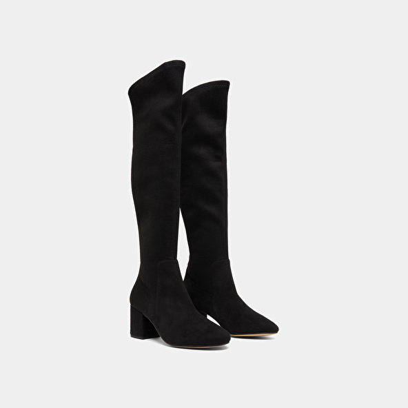 Thigh-high boots with low heels in black stretch and velvet | MIA