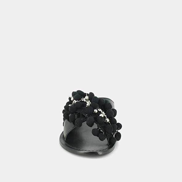 Mules in black leather and textile with pompoms and beads | JACK