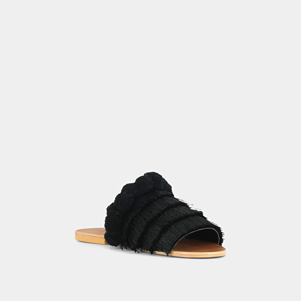 Black textile mules with fringe | JOUJOU