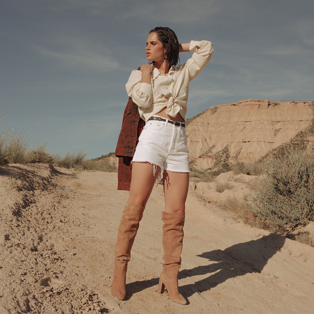 Thigh high boots with square heel in beige suede | CANVA