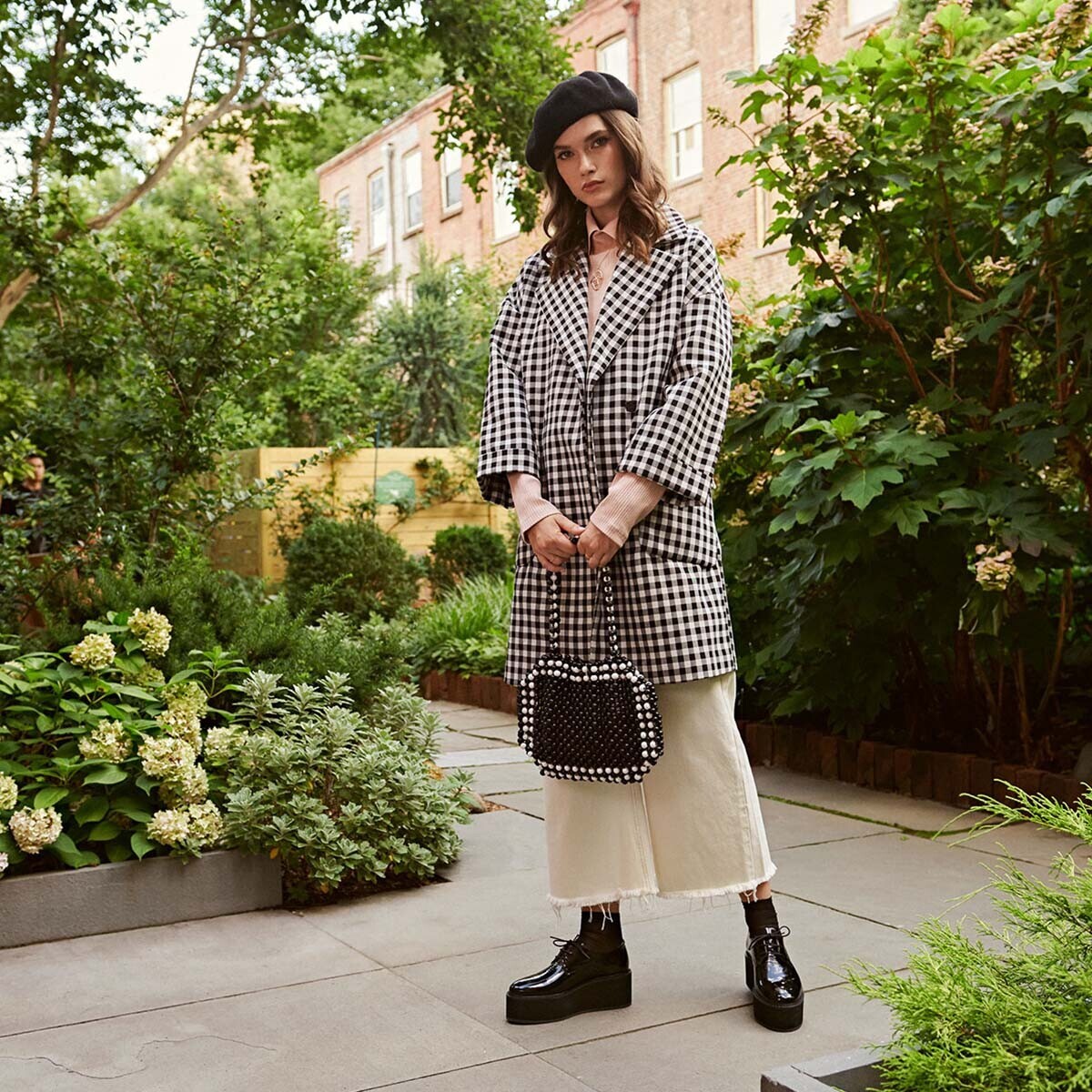 Shiny platform derbies in black leather | ALILOU