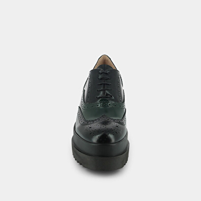 Derbies with thick platform in black and green leather | amico