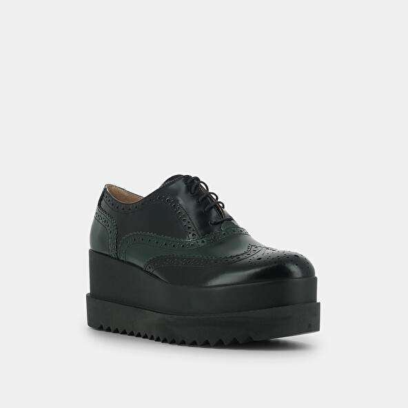 Derbies with thick platform in black and green leather | AMICO