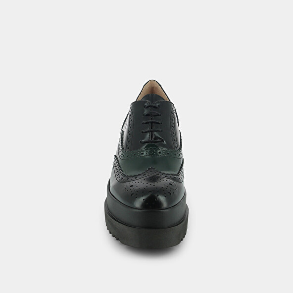 Derbies with thick platform in black and green leather | AMICO