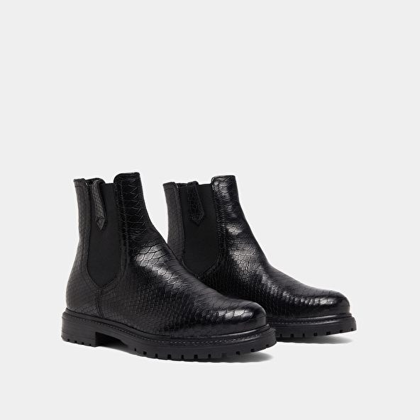 Low boots with notched soles and elastic in black reptile | CANDIDE