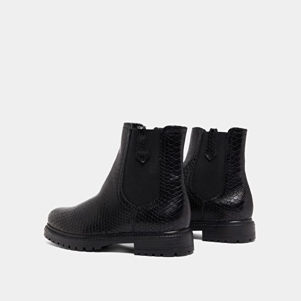 Low boots with notched soles and elastic in black reptile | CANDIDE