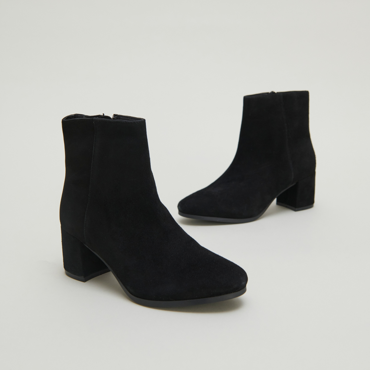 Boots à talons in black suede | ANNICK