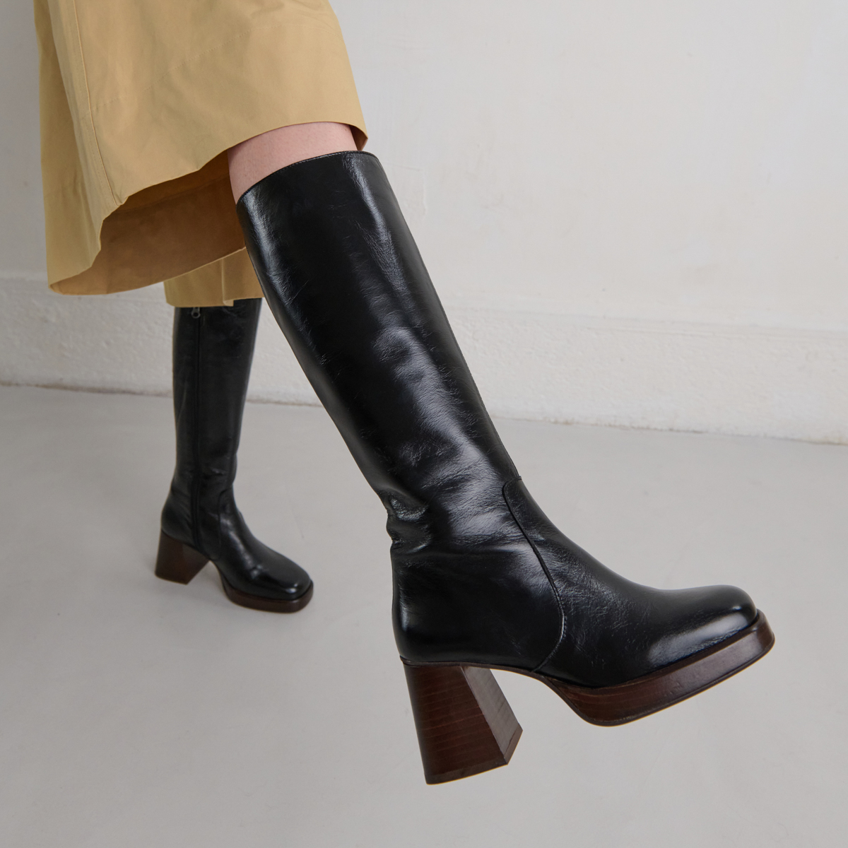 Platform boots in distressed black leather | BETINA