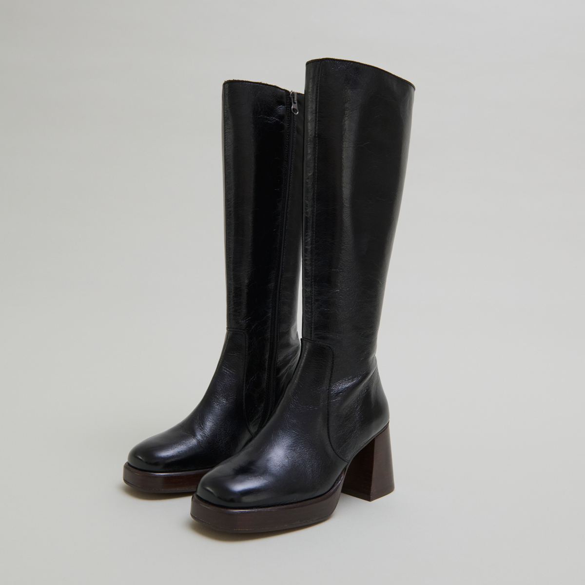 Platform boots in distressed black leather | BETINA