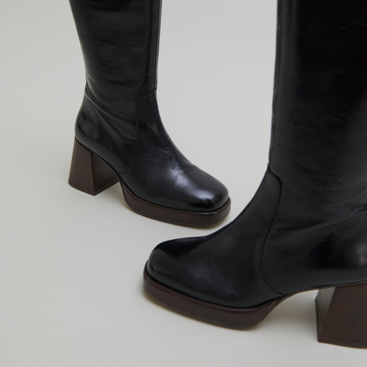 Platform boots in distressed black leather | BETINA