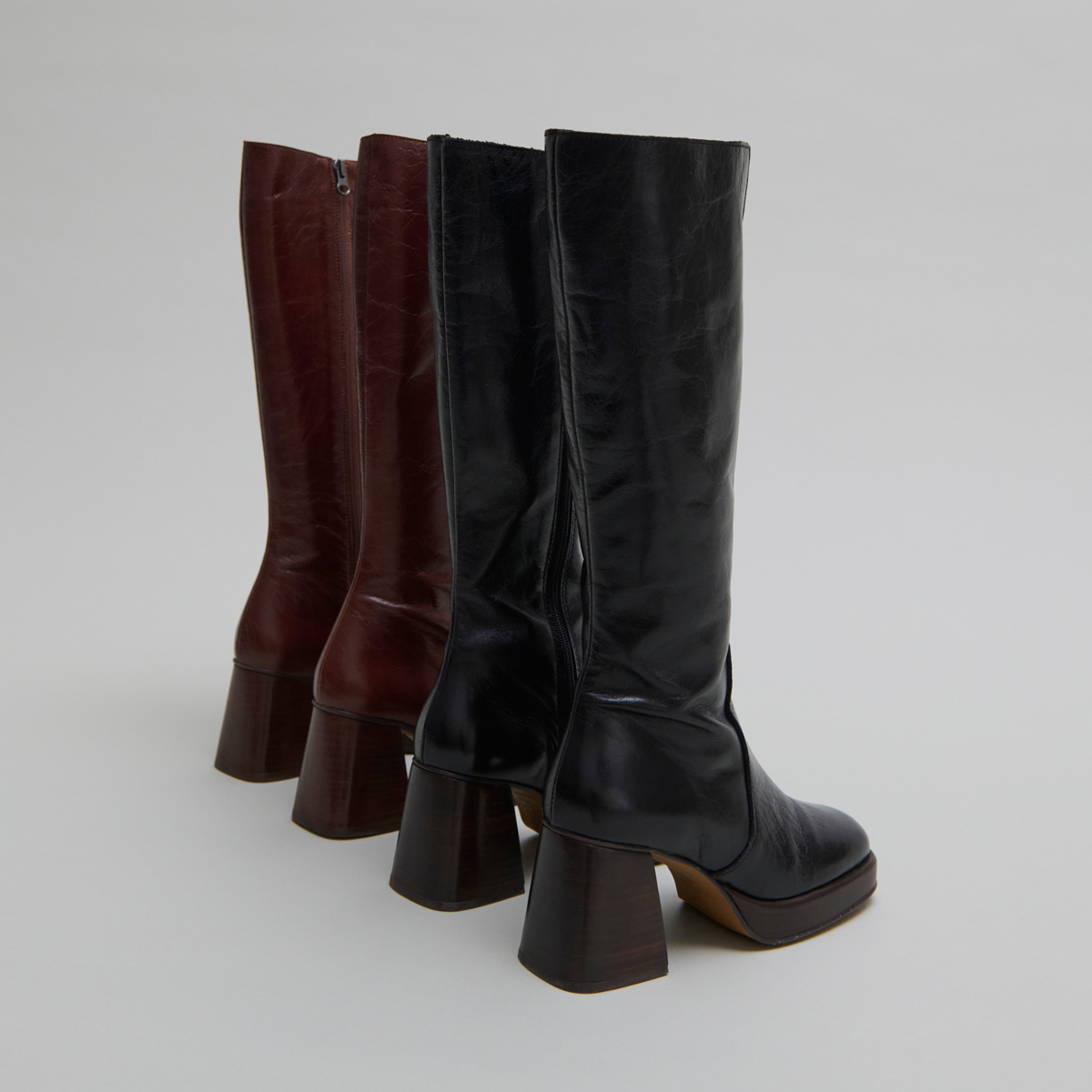 Platform boots in distressed black leather | BETINA