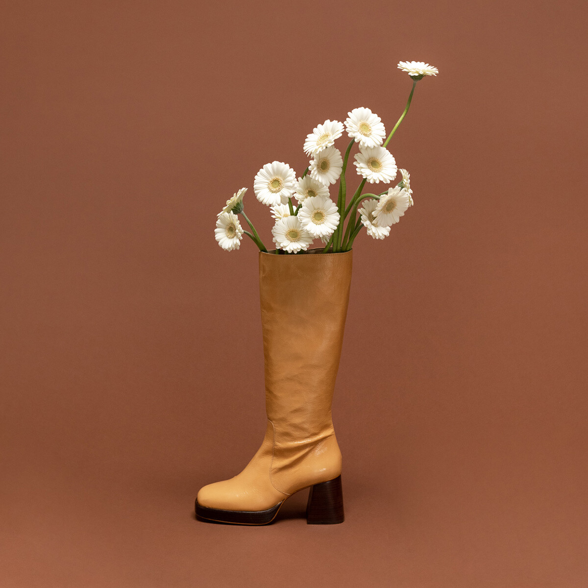 Platform boots in aged camel leather | BETINA
