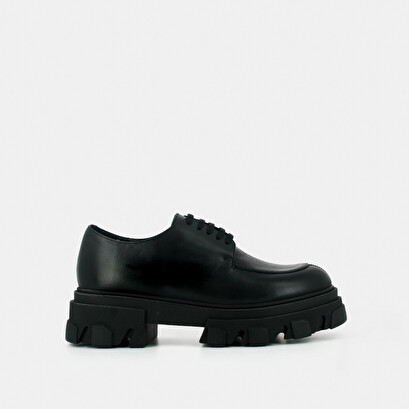 Richelieu with toothed platform in black leather | demer