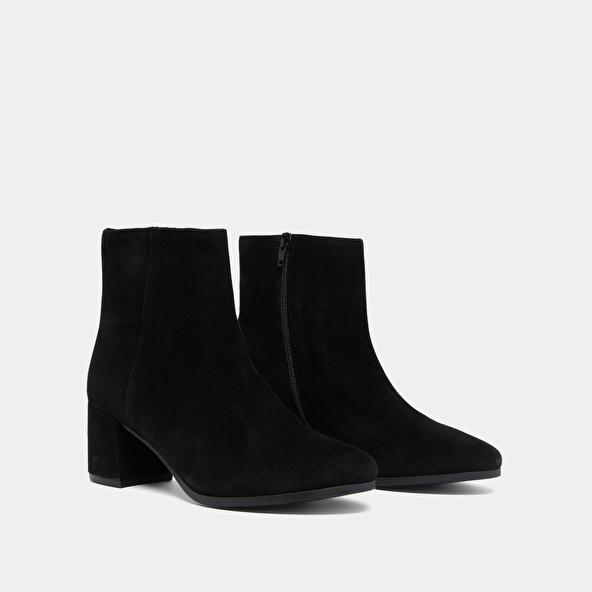 Boots à talons in black suede | ANNICK