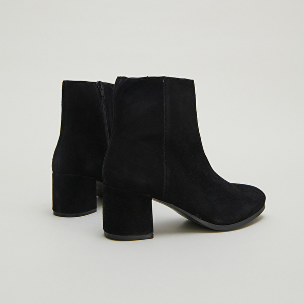 Boots à talons in black suede | ANNICK