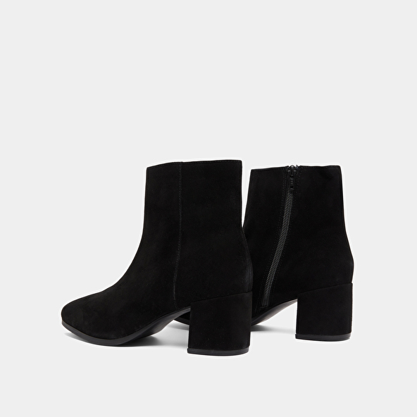 Boots à talons in black suede | ANNICK