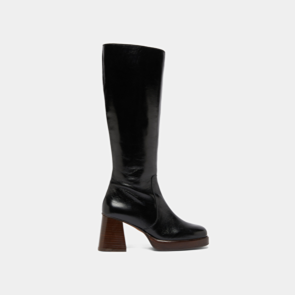 Platform boots in distressed black leather | BETINA