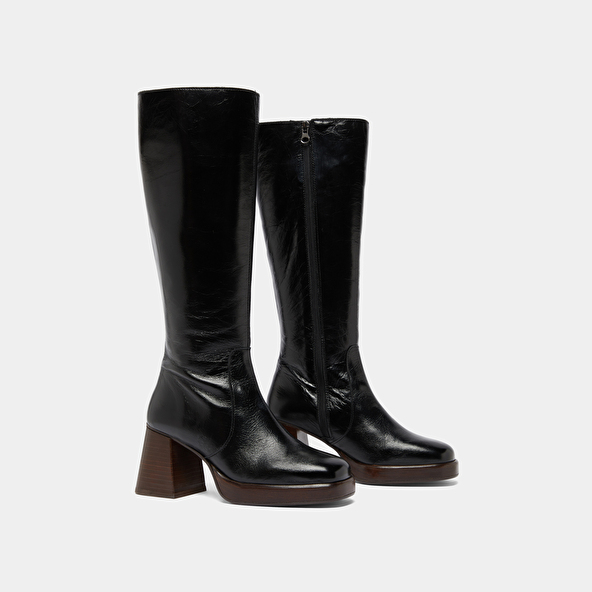 Platform boots in distressed black leather | BETINA