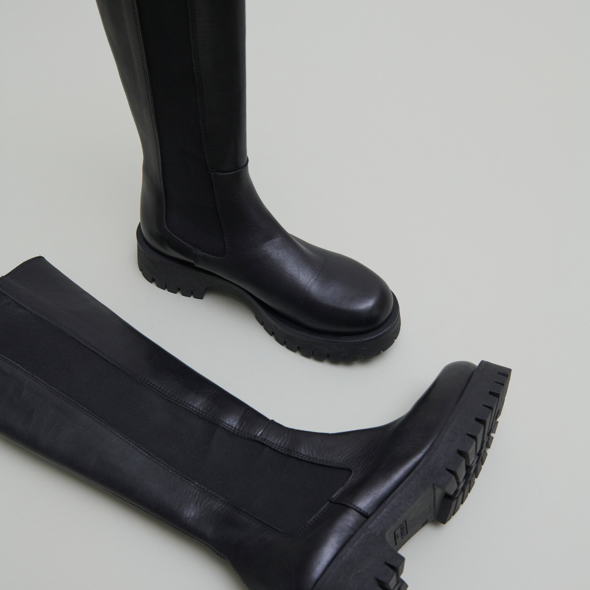 Bottes à plateformes in black leather | REBEL