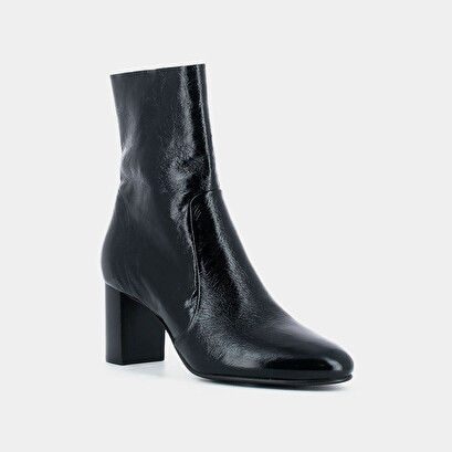Heeled boots in black leather | didlaneo