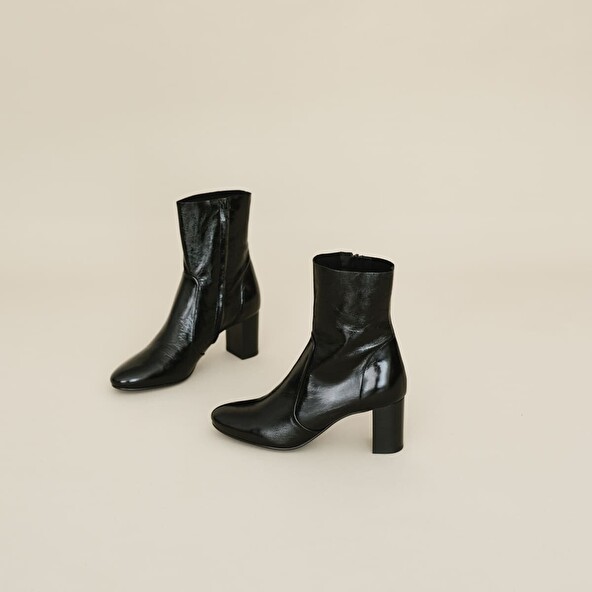 Heeled boots in black leather | DIDLANEO