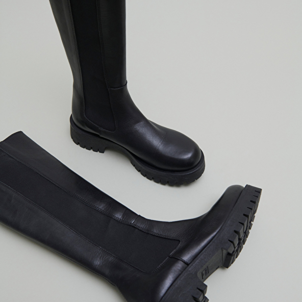 Bottes à plateformes in black leather | REBEL