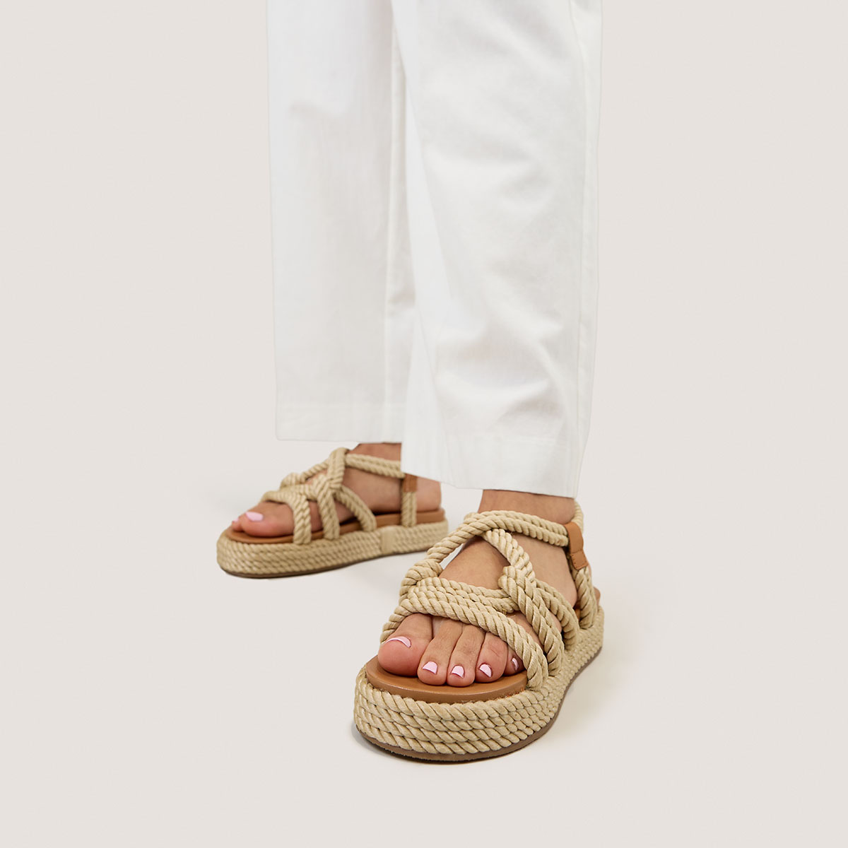 Sandals with cross-over straps in beige rope | WAEL