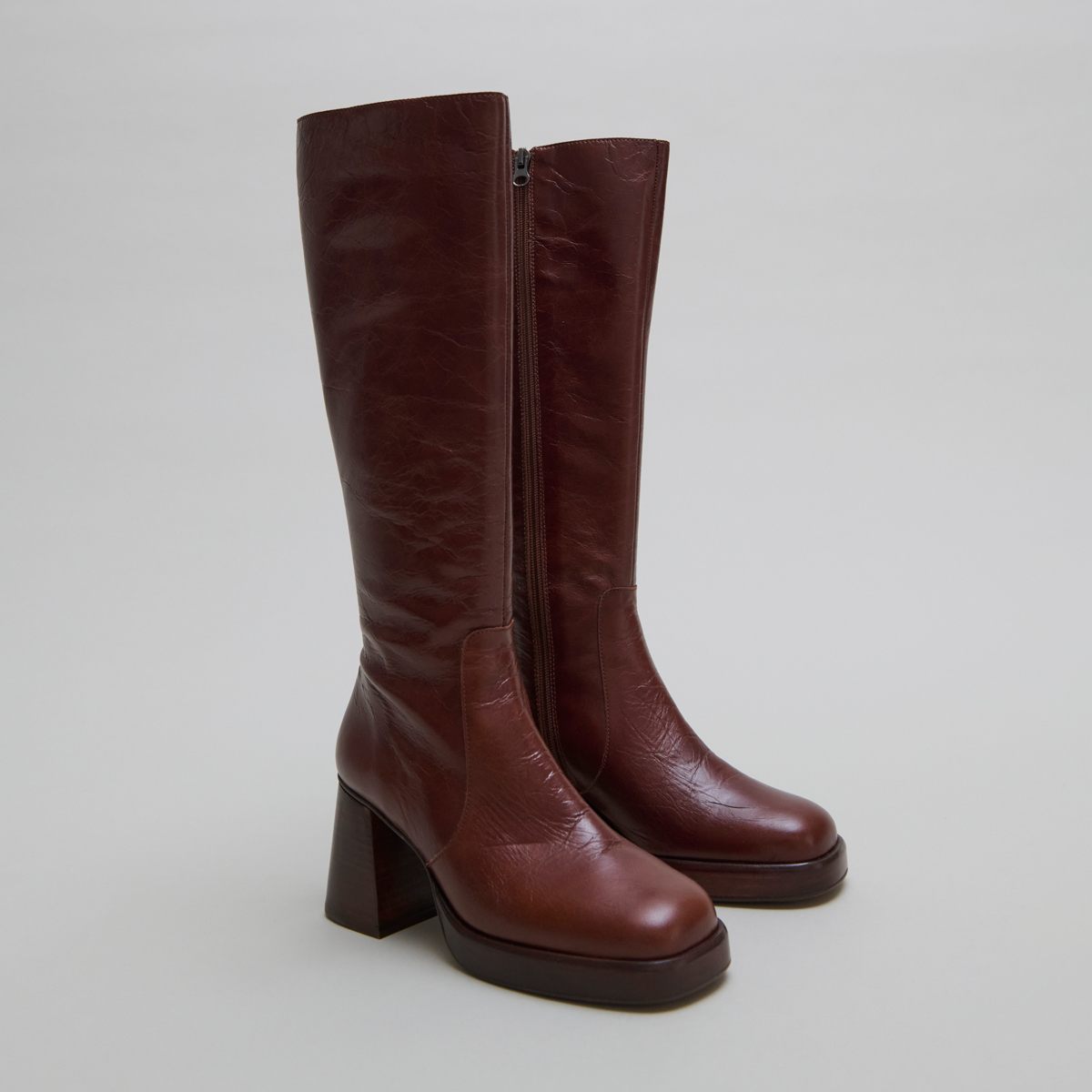 Platform boots in distressed brown leather | BETINA