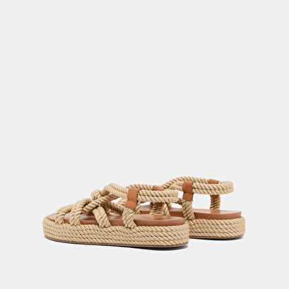 Sandals with cross-over straps in beige rope | wael