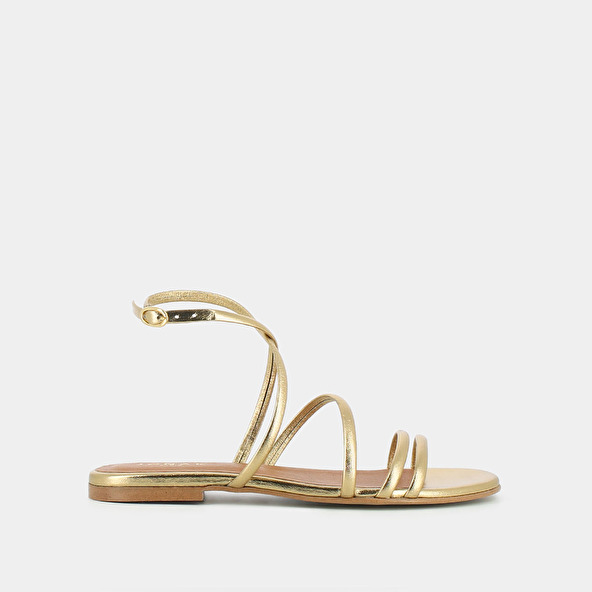 Flat strappy sandals and straps in platinum metallic leather | APOLLINE