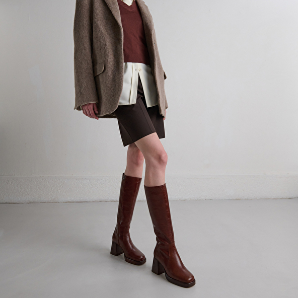 Platform boots in distressed brown leather | BETINA