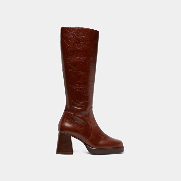 Platform boots in distressed brown leather | BETINA
