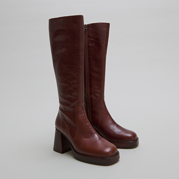 Platform boots in distressed brown leather | BETINA