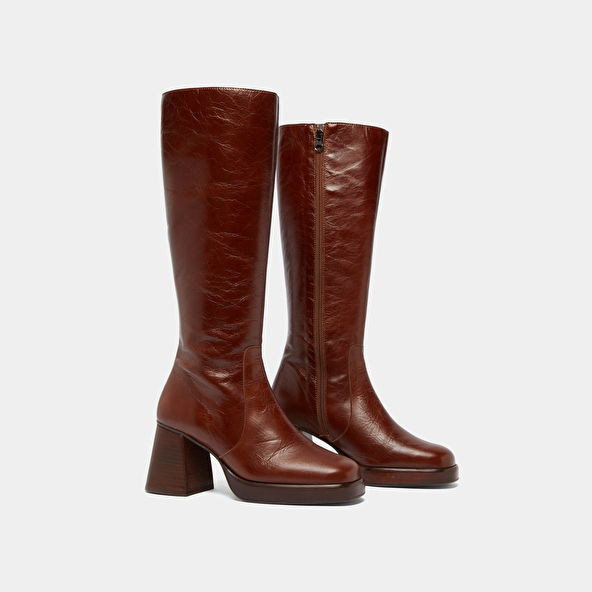 Platform boots in distressed brown leather | BETINA