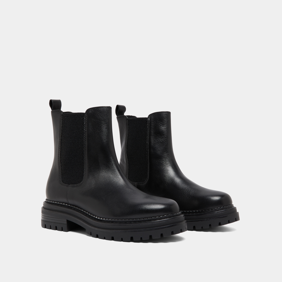 Low boots with notched soles and elastic in black leather | ADALARD