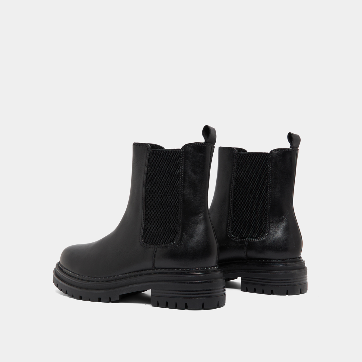 Low boots with notched soles and elastic in black leather | ADALARD