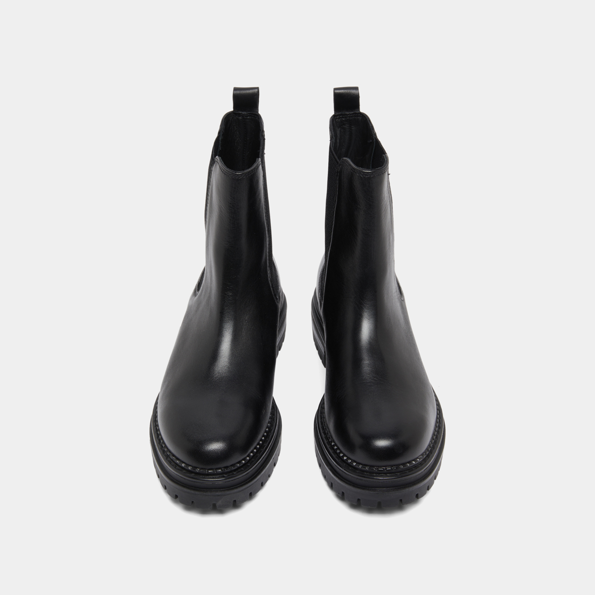 Low boots with notched soles and elastic in black leather | ADALARD