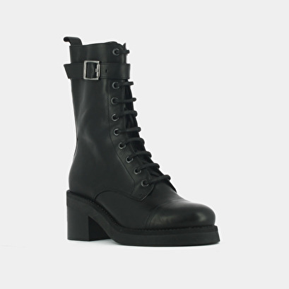 Lace-up ankle boots, heels and silver detail in black greased leather | aconit