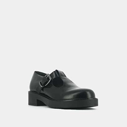 Thick-soled pumps in black shiny leather | didine