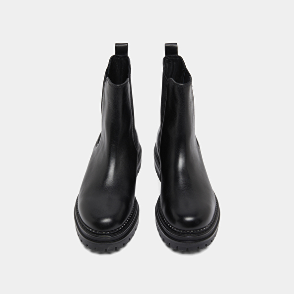 Low boots with notched soles and elastic in black leather | ADALARD