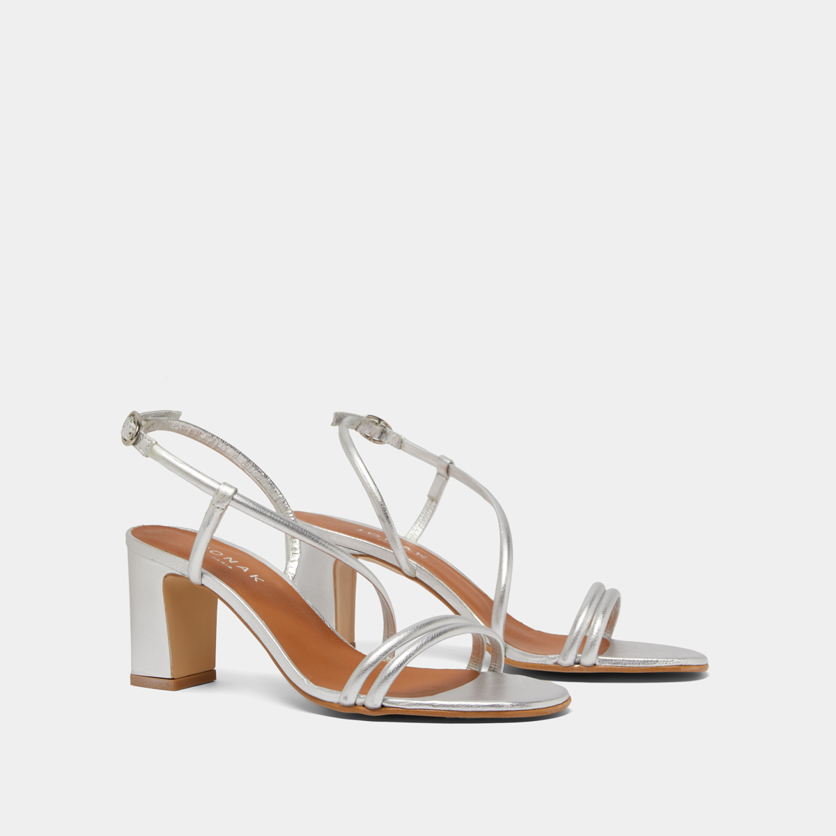 Sandals with heels and straps in silver metallic leather | VICENTE