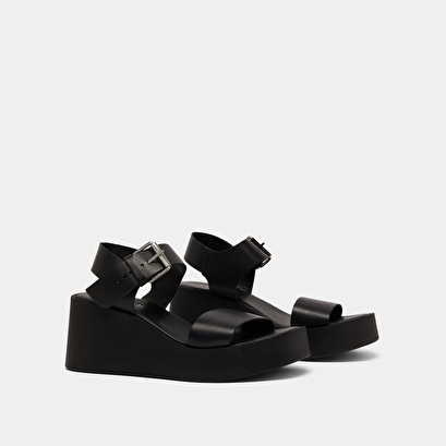 Platform sandals in black leather | ELSA