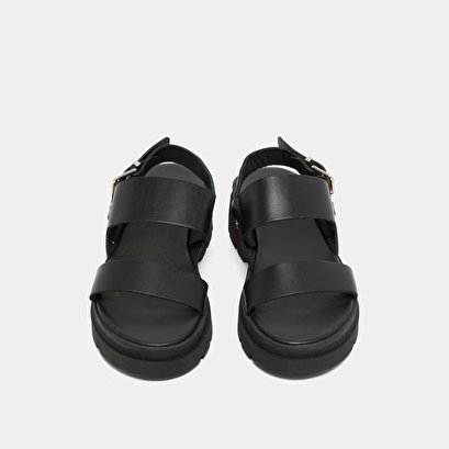 Sandals with thick straps and notched soles in black leather | PEINTURE