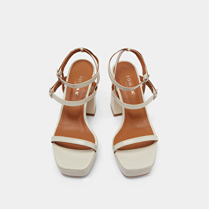 Strap and platform sandals in unbleached distressed leather | vlado
