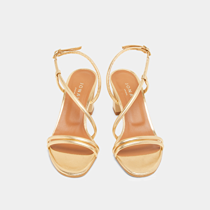 Sandals with heels and straps in gold metallic leather | vicente