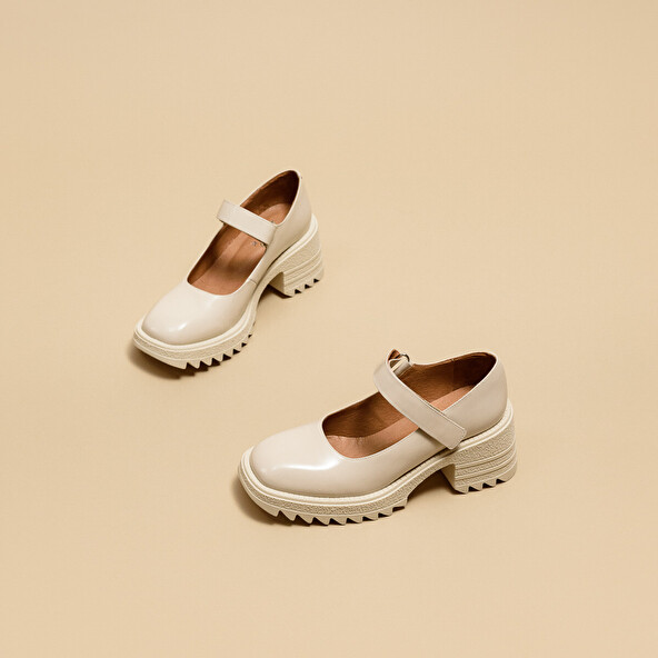 Babies with notched soles in glazed ecru leather | DOVY