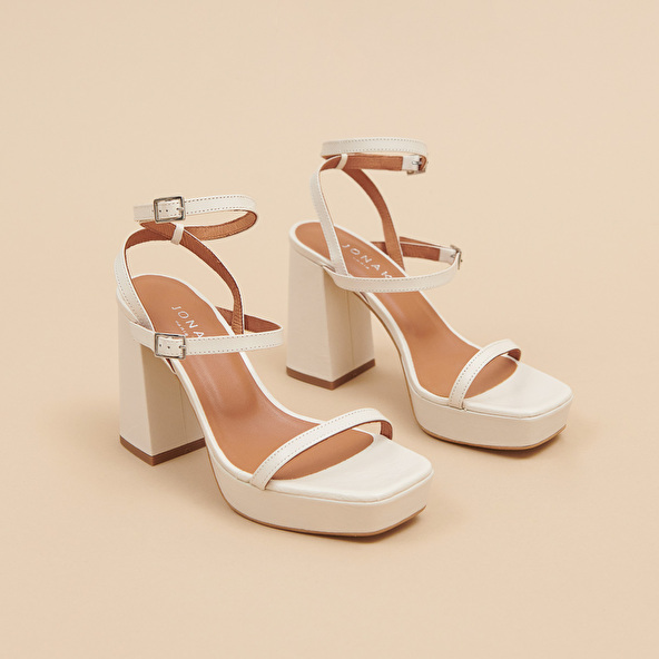 Strap and platform sandals in unbleached distressed leather | VLADO