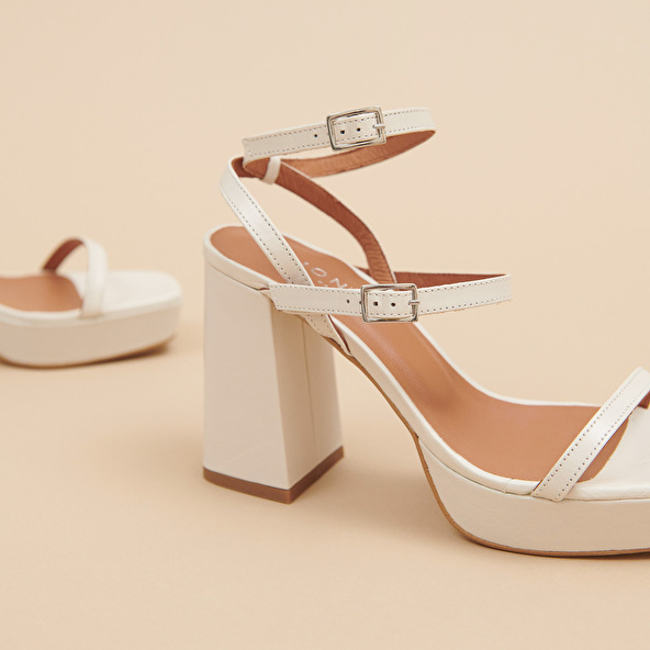 Strap and platform sandals in unbleached distressed leather | VLADO